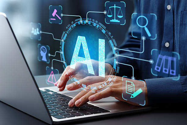 AI businessman typing on laptop computer keyboard at desk in office.